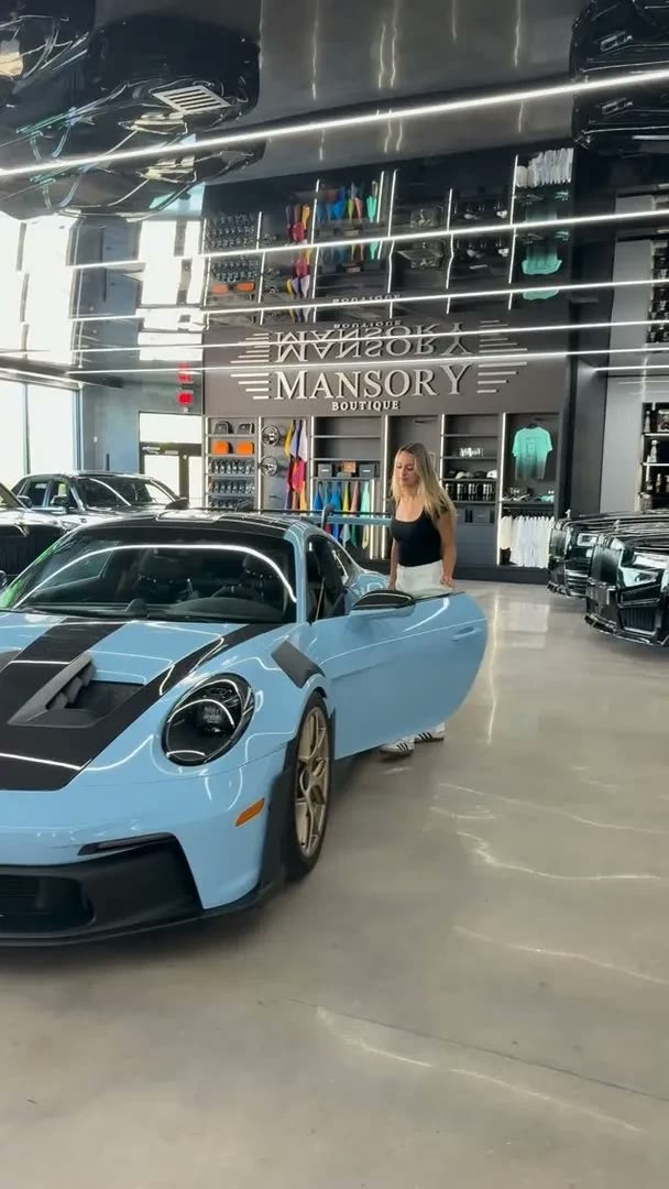 Blue Porsche in the Mansory showroom